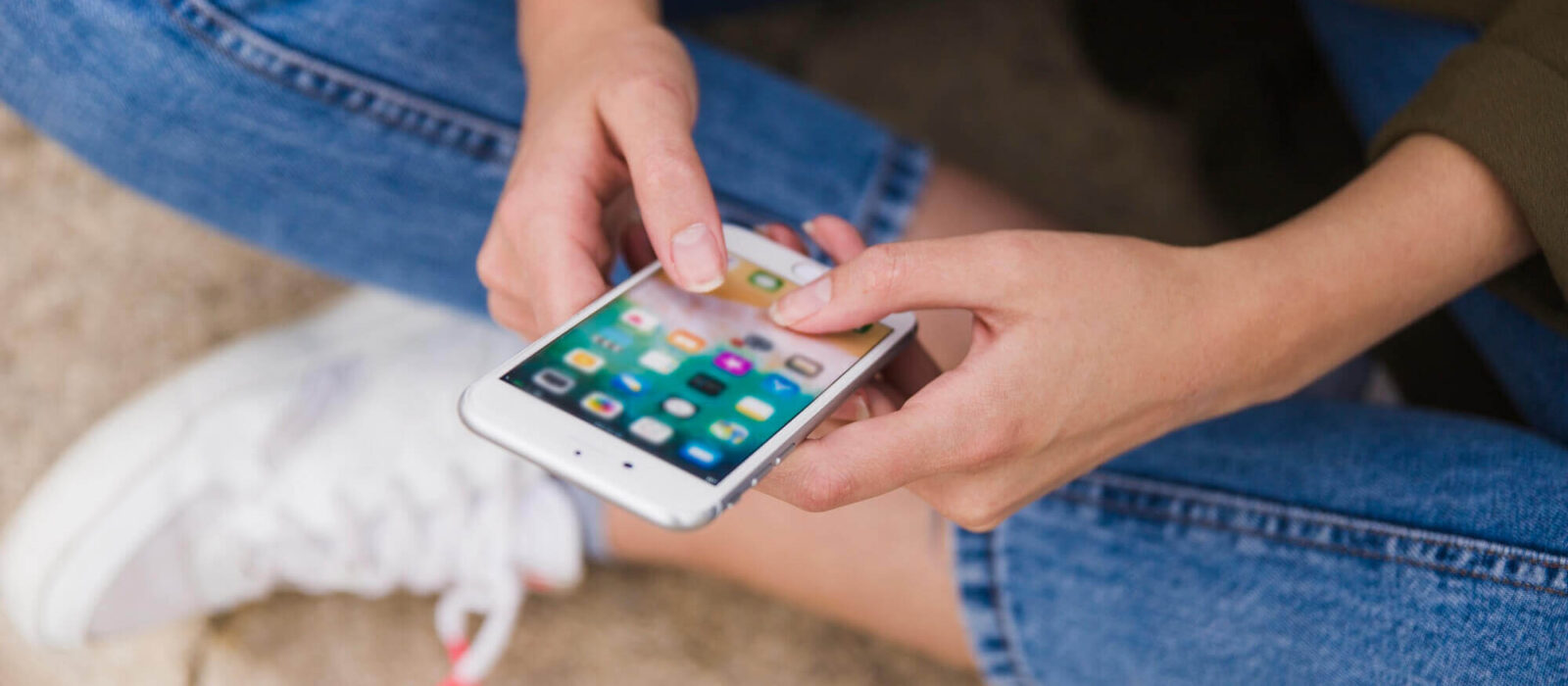 close up woman using mobile phone